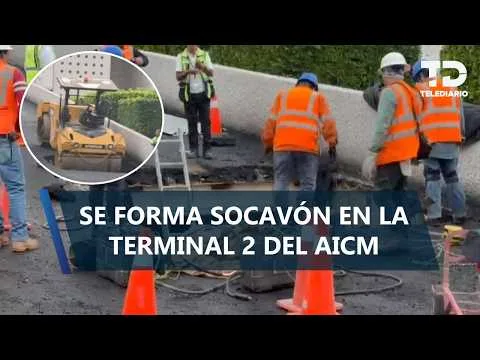 Socavón en acceso a Terminal 2 del AICM provoca caída de máquina pavimentadora